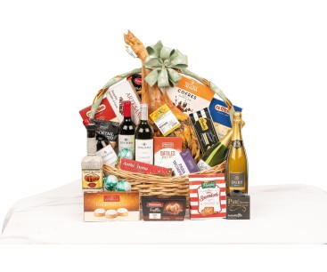 Cesta arco alto HORECA con paleta serrana Atienza, crema de orujo Panizo y dulces navideños