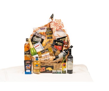 Cesta arco alto especial con paleta Jamonería Real, ron Flor de Caña y Rioja Reserva